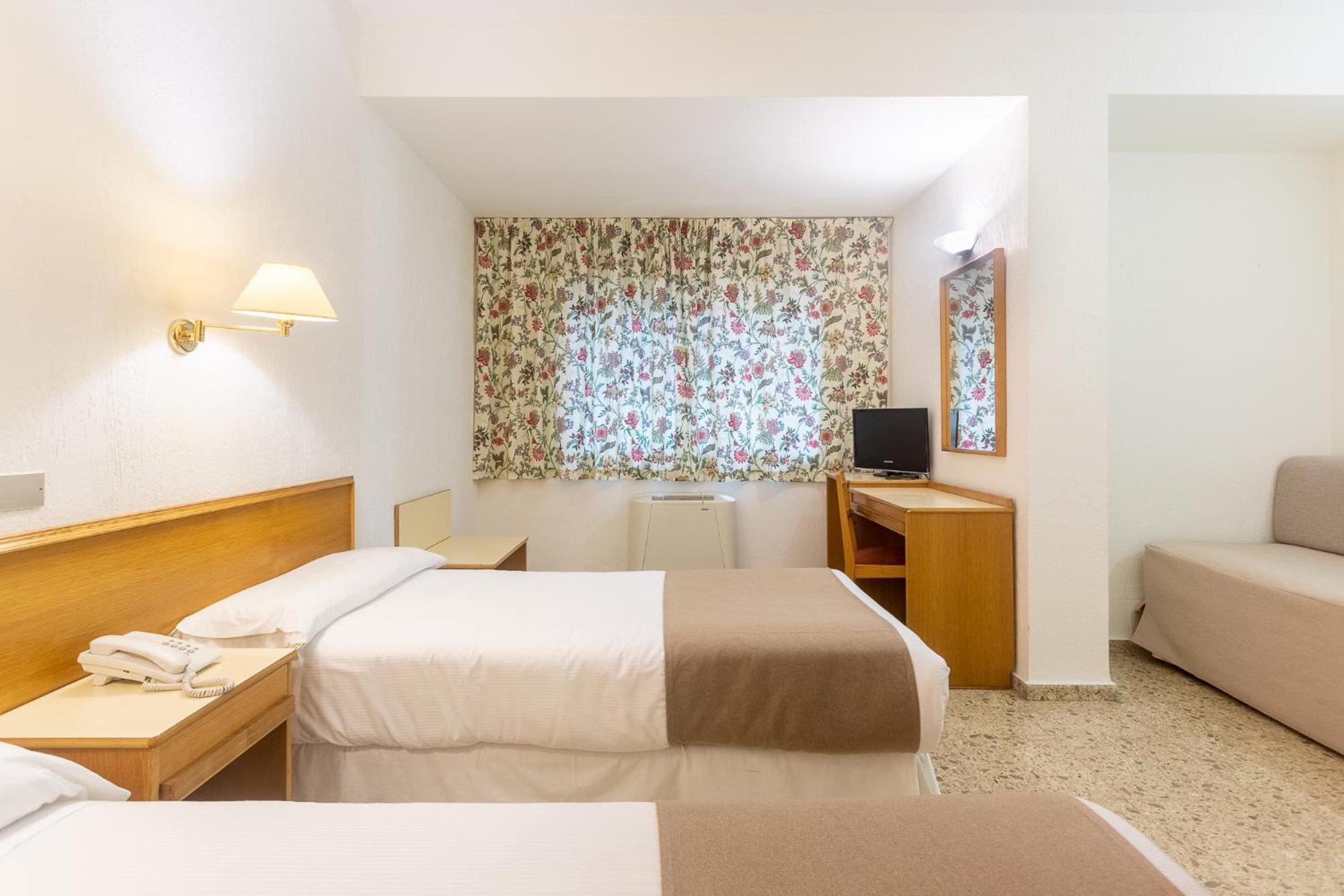Triple Room (2 Adults + 1 Child)