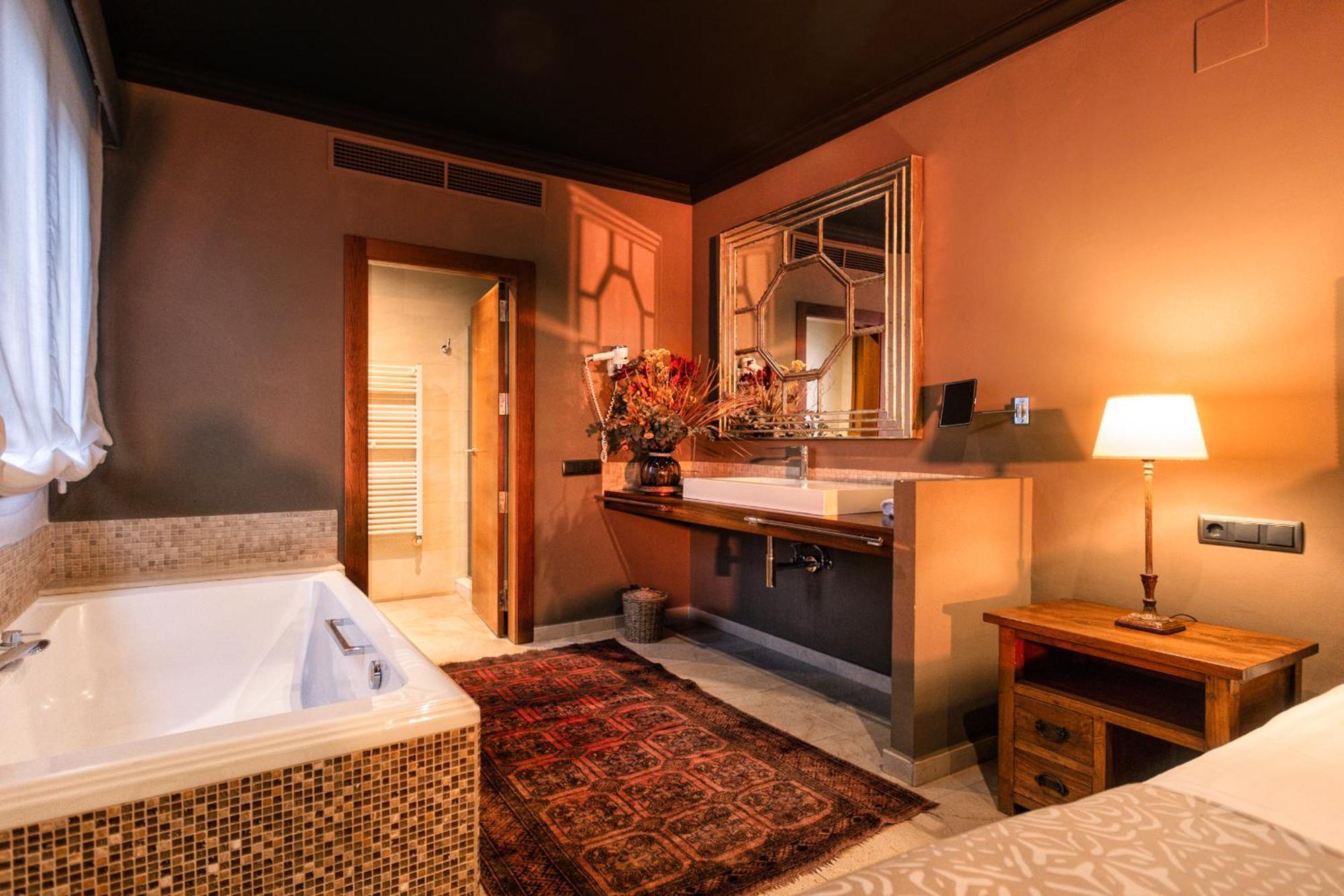 Kamer met Queensize Bed en Terras