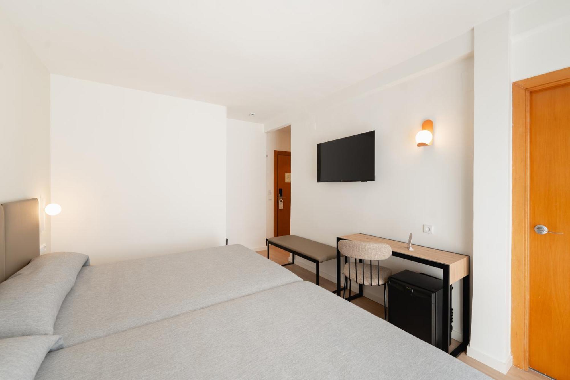 Quarto Duplo Superior (2 Adultos + 2 Crianças)
